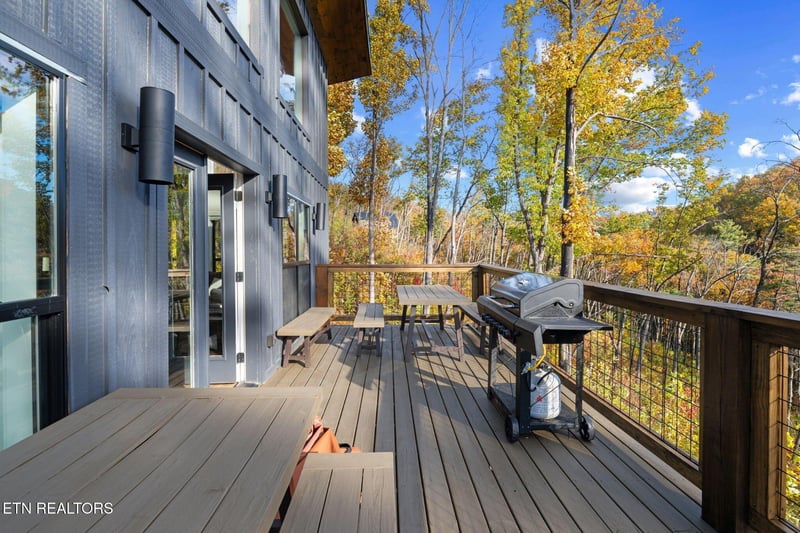 This propertys woodland setting radiates autumn charm, with golden foliage framing the peaceful surroundings throughout the season.