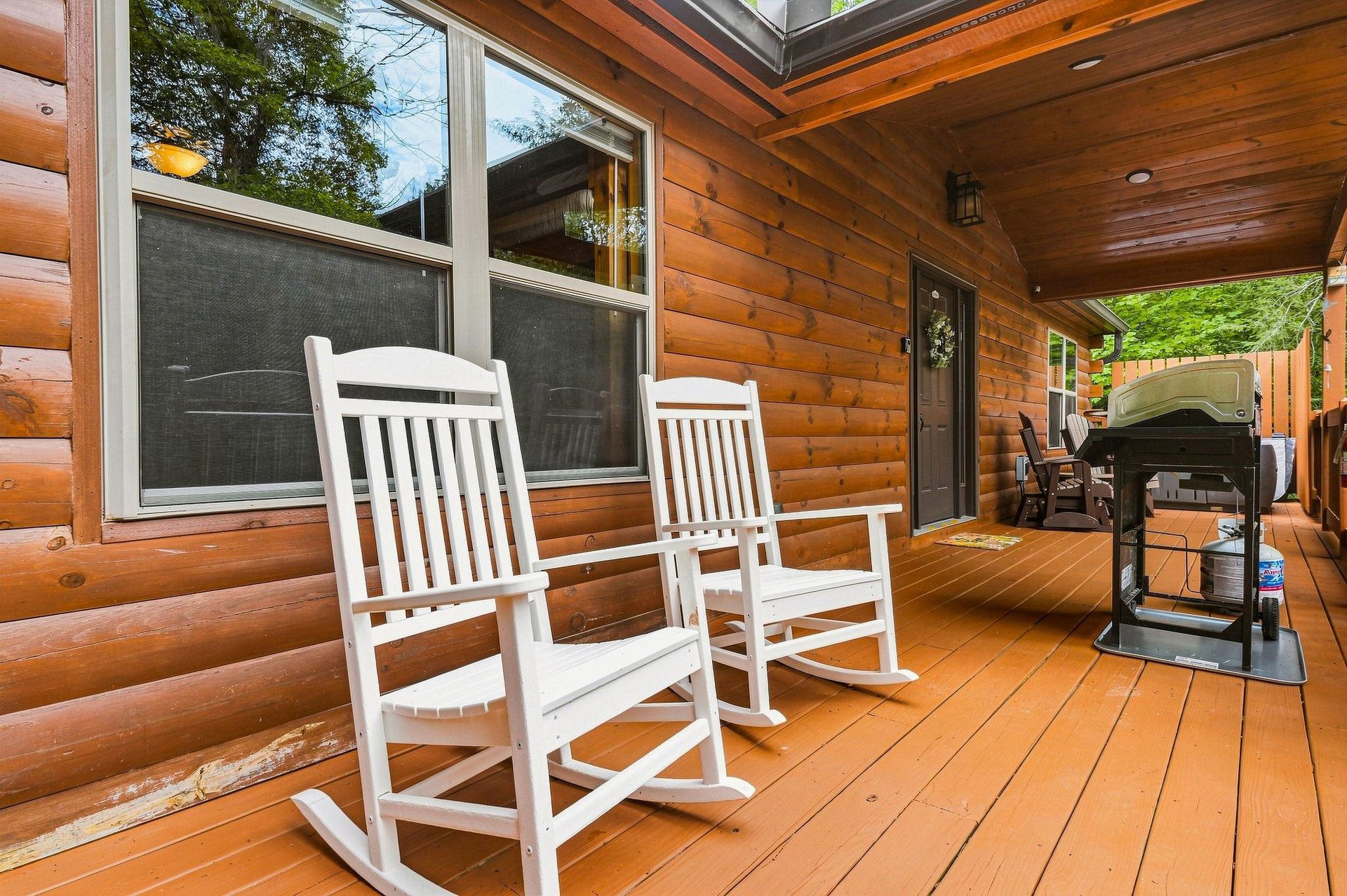 Settle into these classic rockers and breathe in fresh mountain air, or fire up the grill for an evening cookout on your private covered deck.