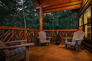 Settle into these cozy Adirondack chairs on your private deck and let the forests peaceful embrace wash over you as evening light filters through the trees.