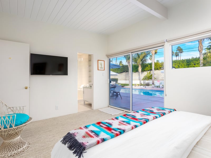 A gorgeous bedroom with outdoor access