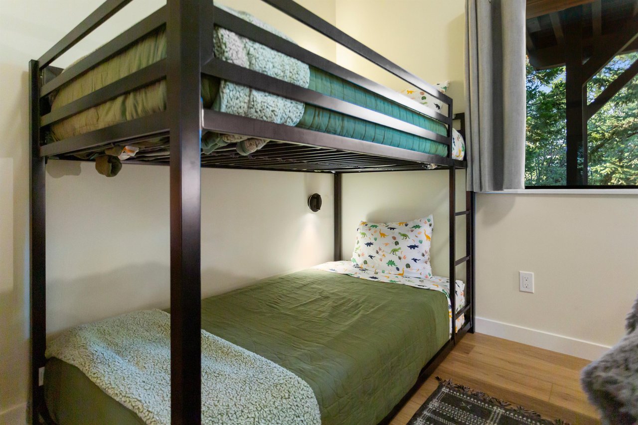 3 beds perfect for a close group. Guest enjoy individual lights for each bunk. A packnplay is also available.