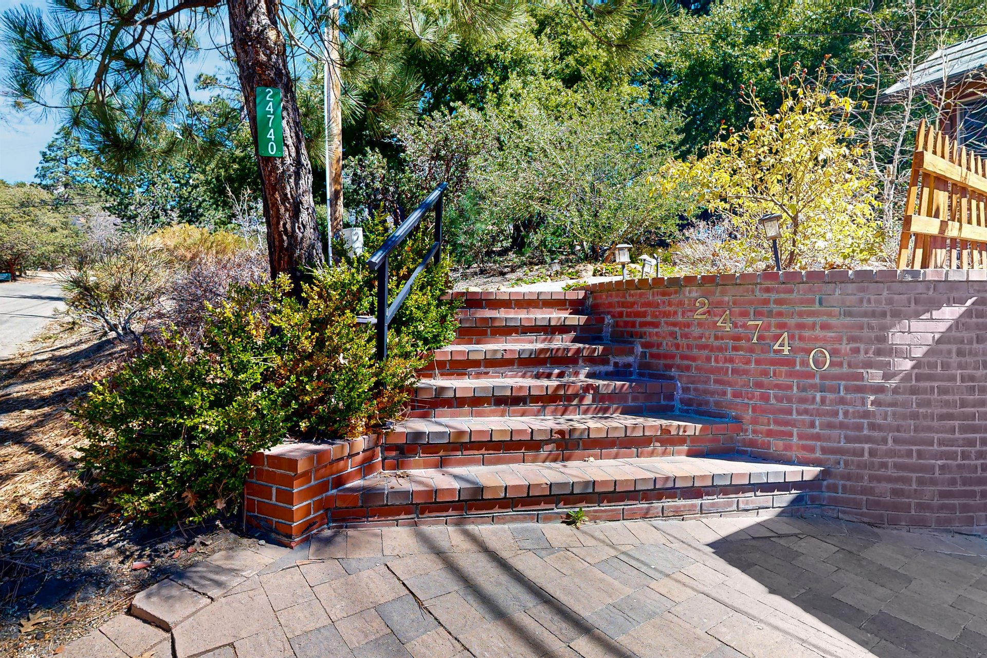 Front steps near garage, leading to the front of the home.