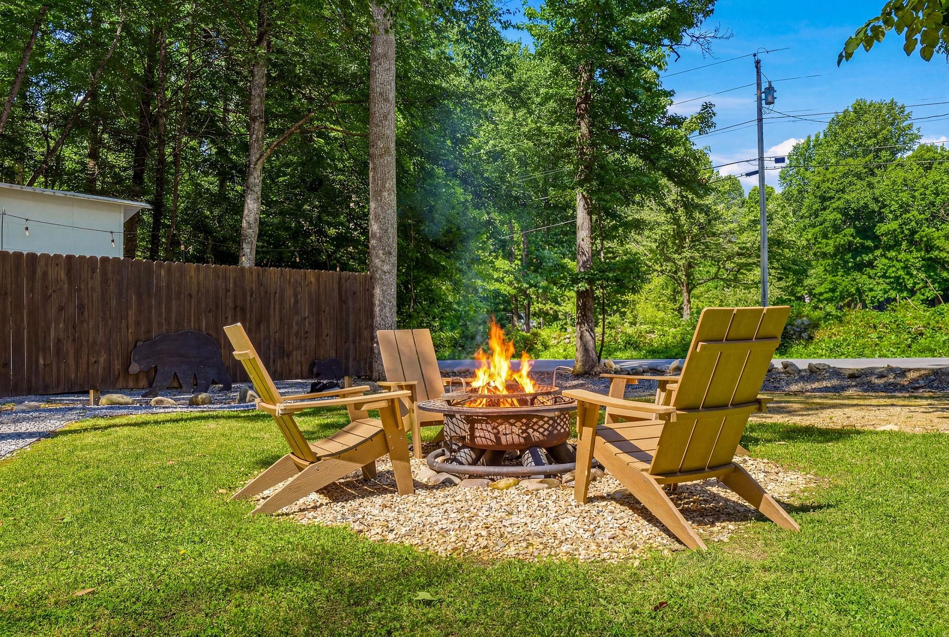 Gather around the fire pit for cozy evenings under the trees, with comfy Adirondack chairs perfect for stargazing and smores.