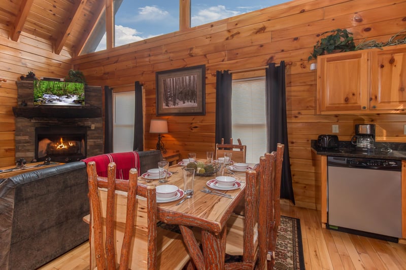 Dining room with seating for six at Country Bears Getaway, a 3bedroom cabin rental located in Gatlinburg
