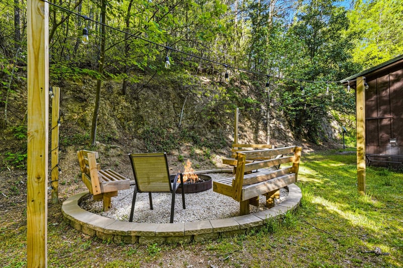 Gather around your private fire pit surrounded by forest tranquility, perfect for evening smores and stargazing memories.