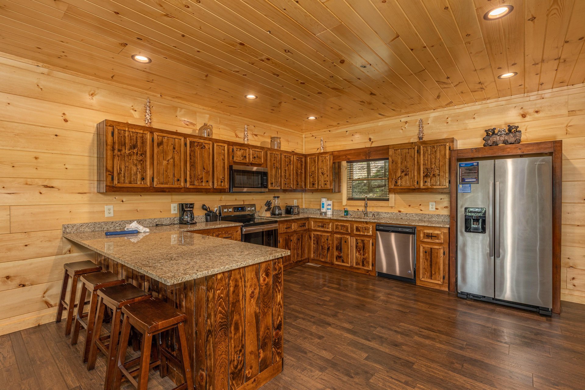 Full kitchen with natural wood cabinets