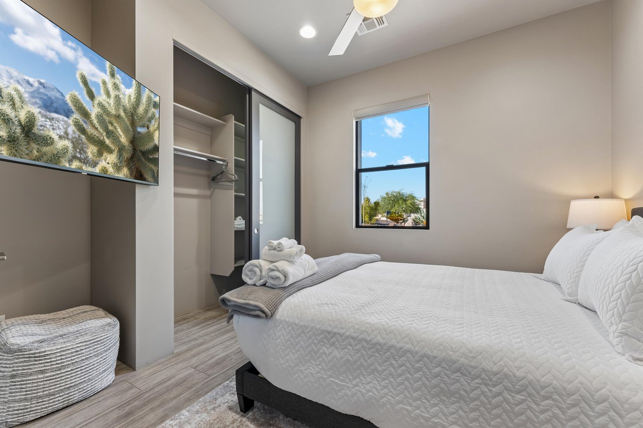 Queen size bed, flatscreen TV, and plenty of closet space.
