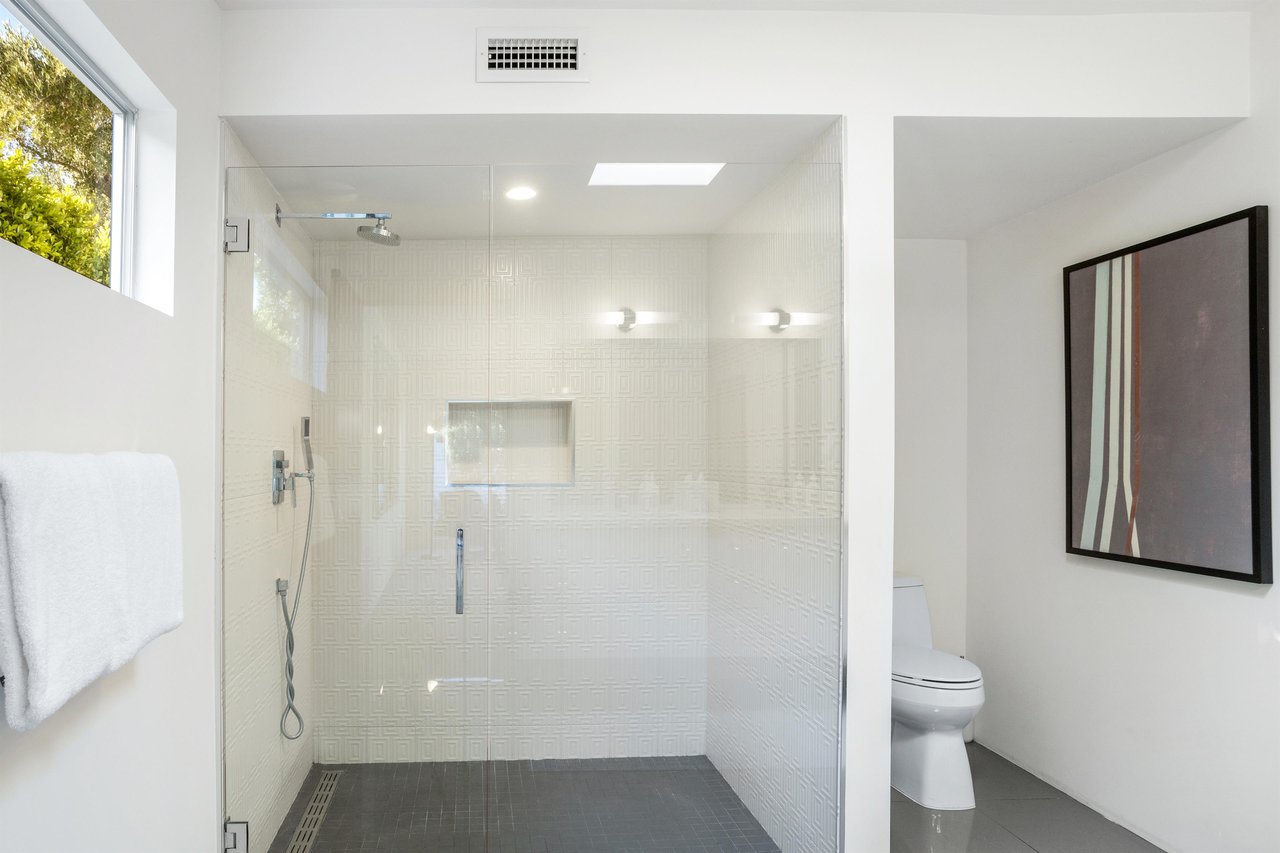 Spacious walk in shower in ensuite bath