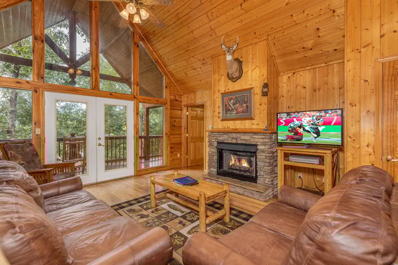 Living room with stone fireplace