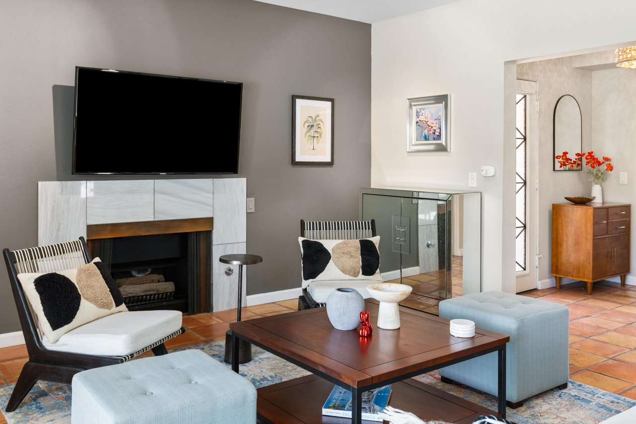 Additional view of fireplace and TV.
