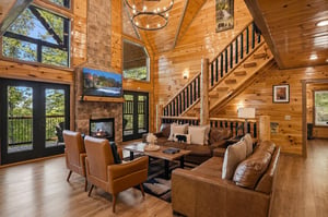 Sink into plush leather seating by your crackling stone fireplace, surrounded by soaring woodbeamed ceilings and forest views through floortoceiling windows.