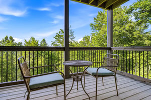 Unwind on your private balcony with sweeping forest views, where morning coffee or evening relaxation feels effortlessly peaceful surrounded by nature.