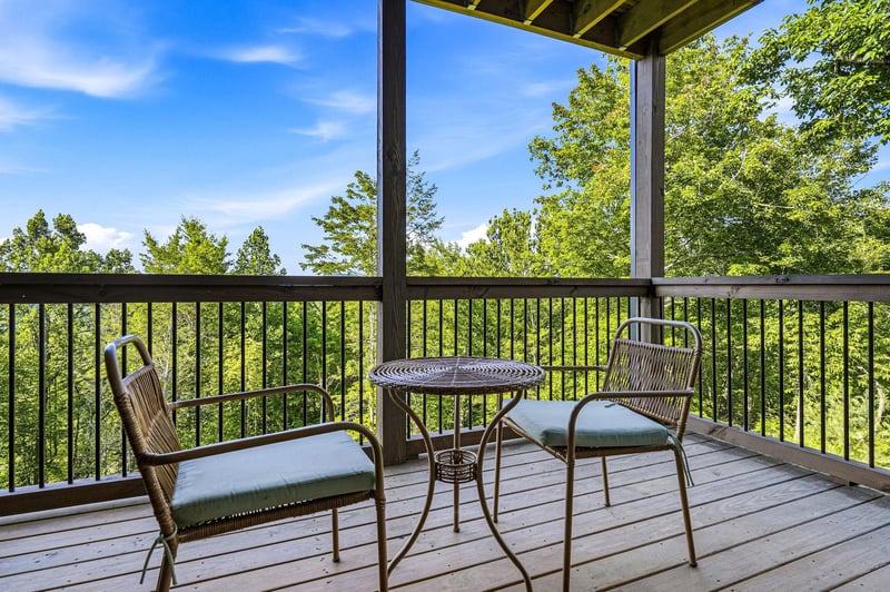 Unwind on your private balcony with sweeping forest views, where morning coffee or evening relaxation feels effortlessly peaceful surrounded by nature.
