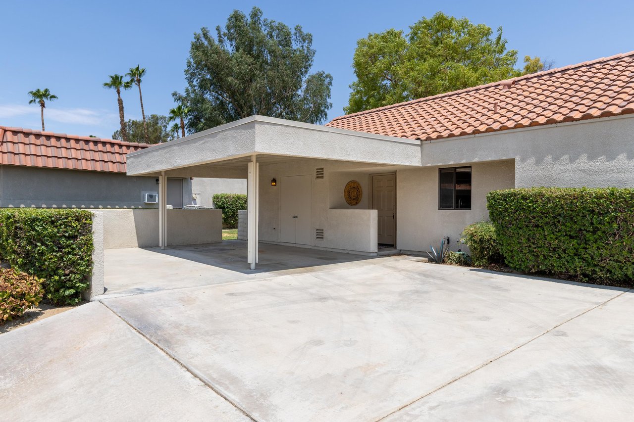 View of driveway and front door.