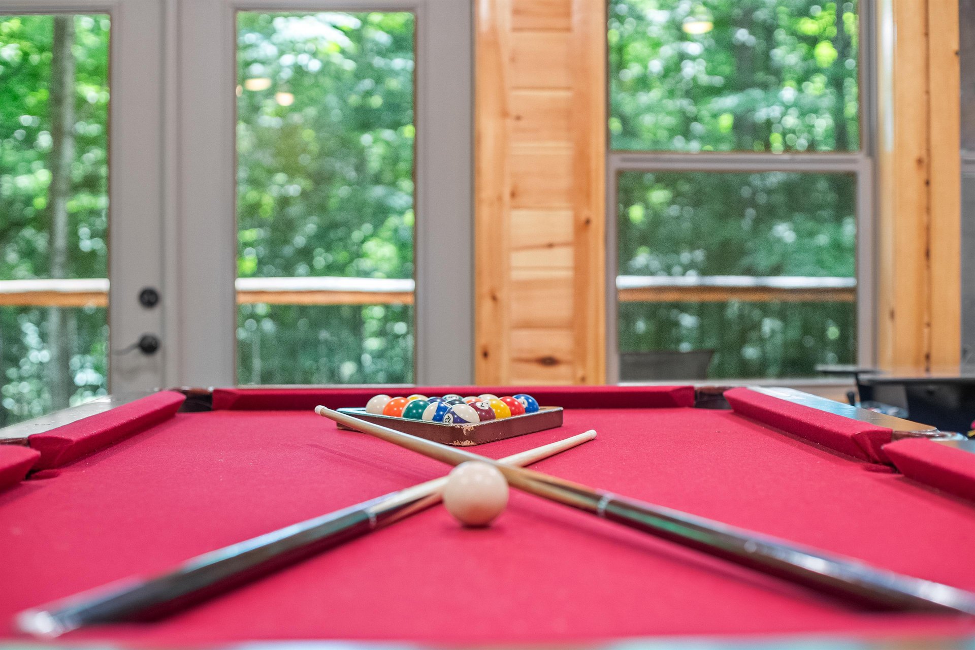 pool table, futon and arcade