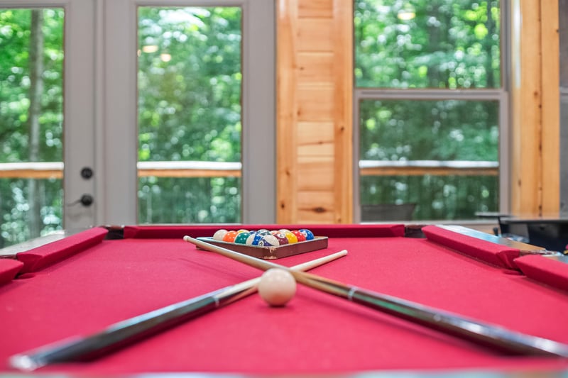 pool table, futon and arcade