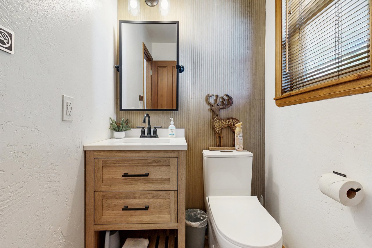 Half bathroom with modern fixtures.