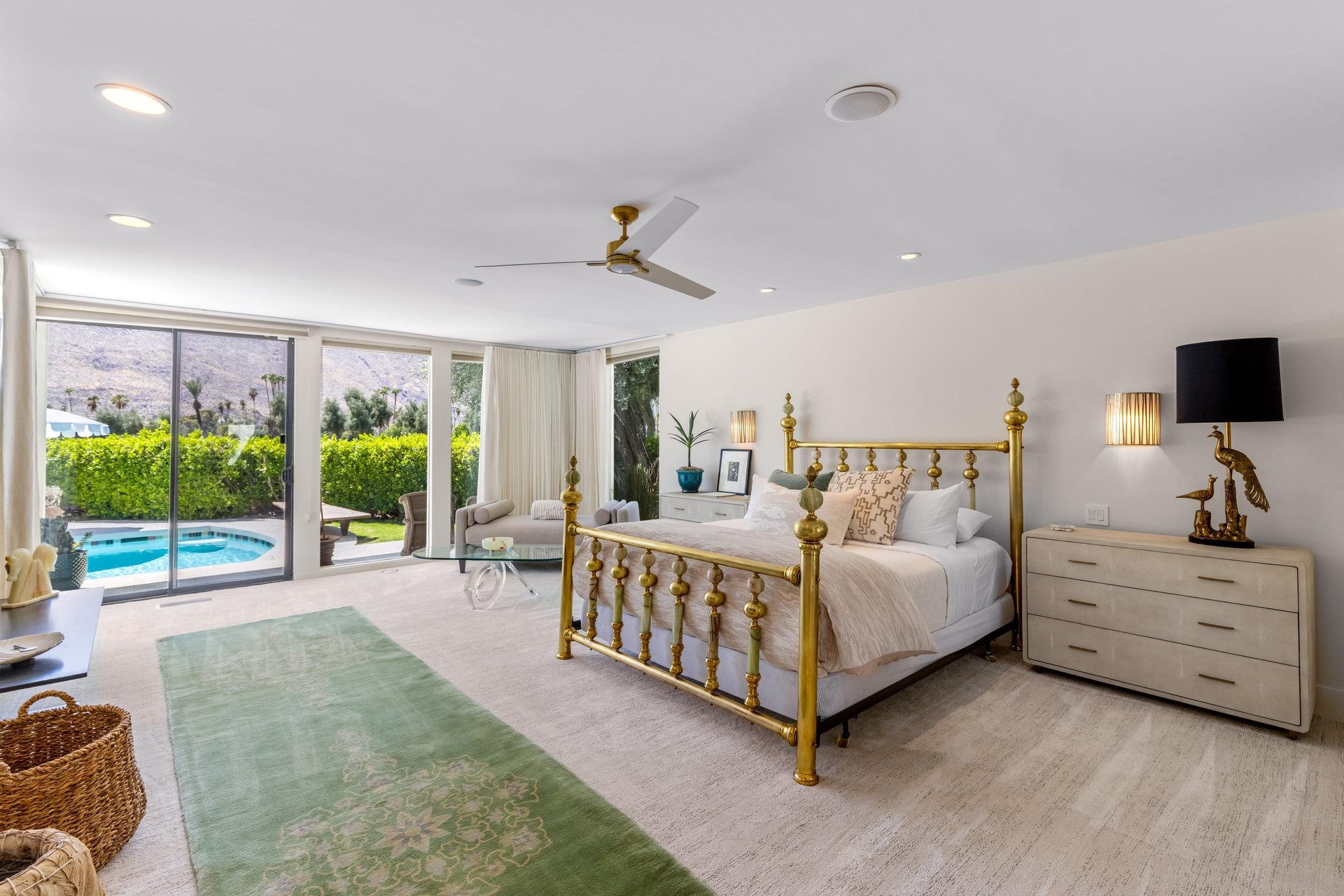 King size bed, gas fireplace, flatscreen TV, patio access, pool view, wet bar, and ensuite bathroom with outdoor shower.