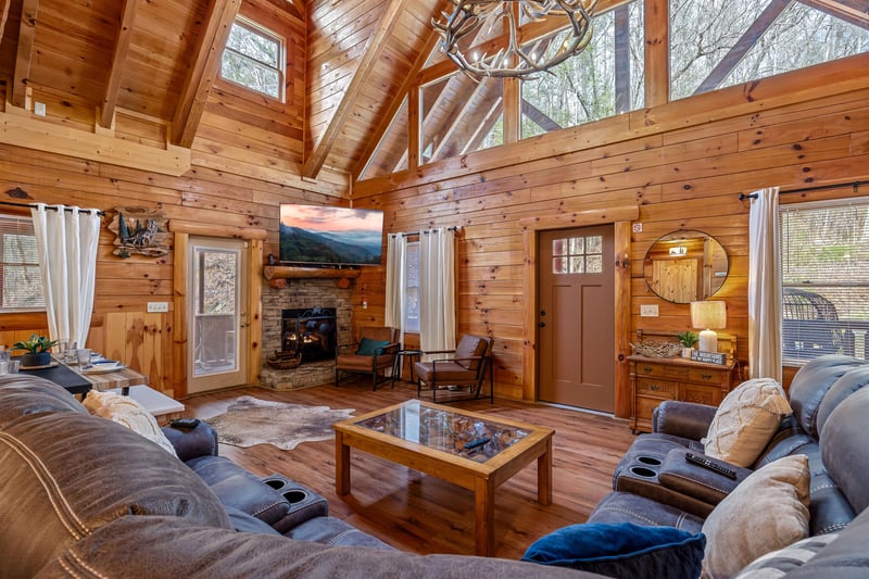 Sectional couch with coffee table and corner fireplace