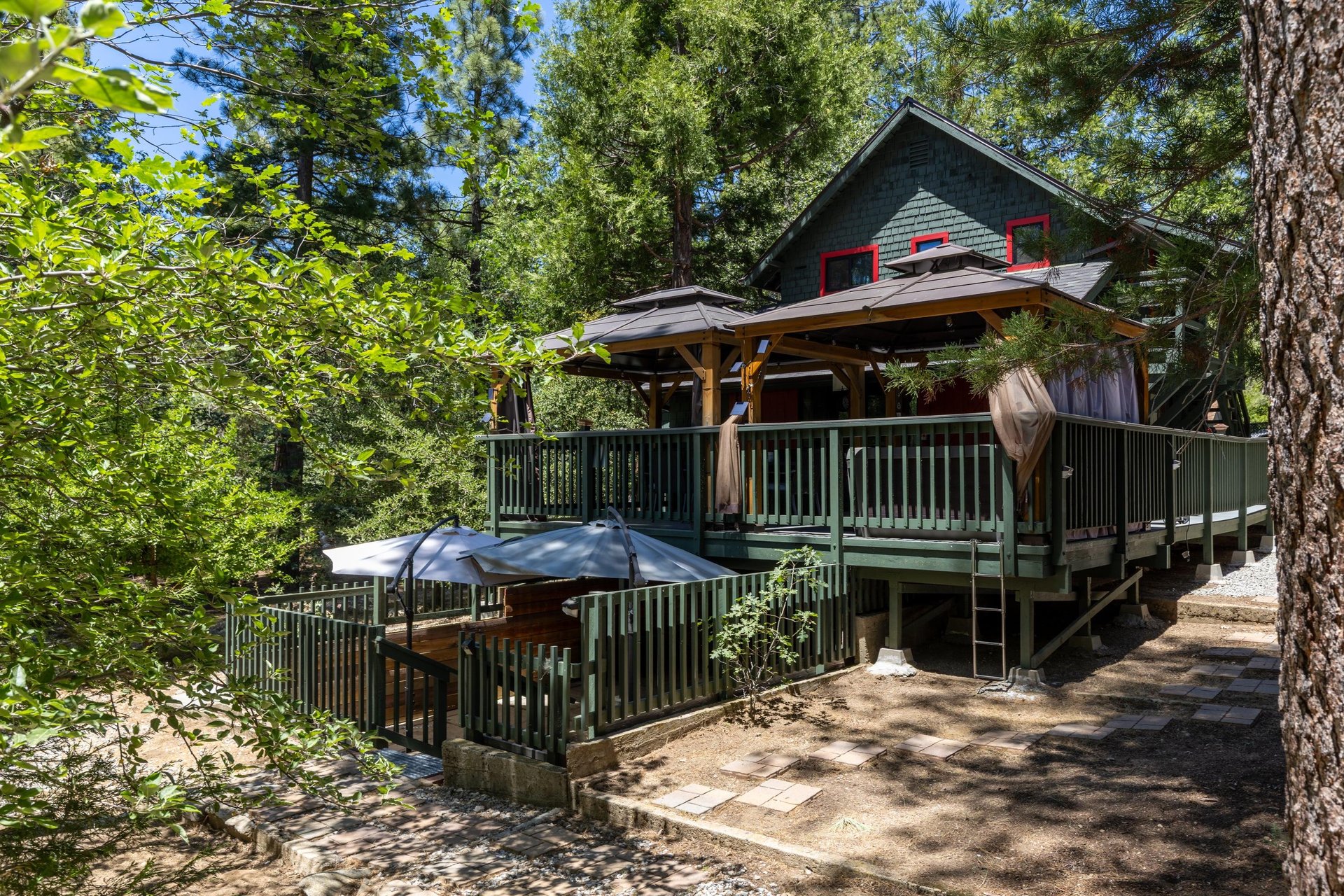 View of the entrance to the lower level outdoor seating area below the main deck.