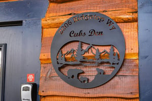 Welcome to Cubs Den, your mountain retreat at 2606 Ridgetop Way, where rustic charm meets modern comfort in this beautifully appointed cabin.