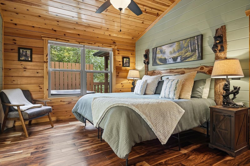 Drift off in this cozy bedroom, where rustic wood beams and soft linens invite a peaceful nights rest after your adventures.