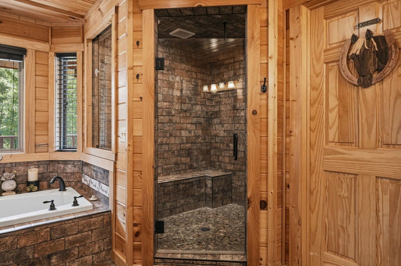 Unwind in your private spainspired bathroom, where rustic stone meets modern luxury. Soak in the deep tub or refresh under the walkin shower—your perfect retreat after a day of adventure.