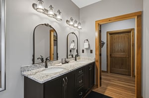 Freshen up at your private dualsink vanity with elegant fixtures and plenty of storage. The spacious granite countertop and bright lighting make getting ready a breeze.