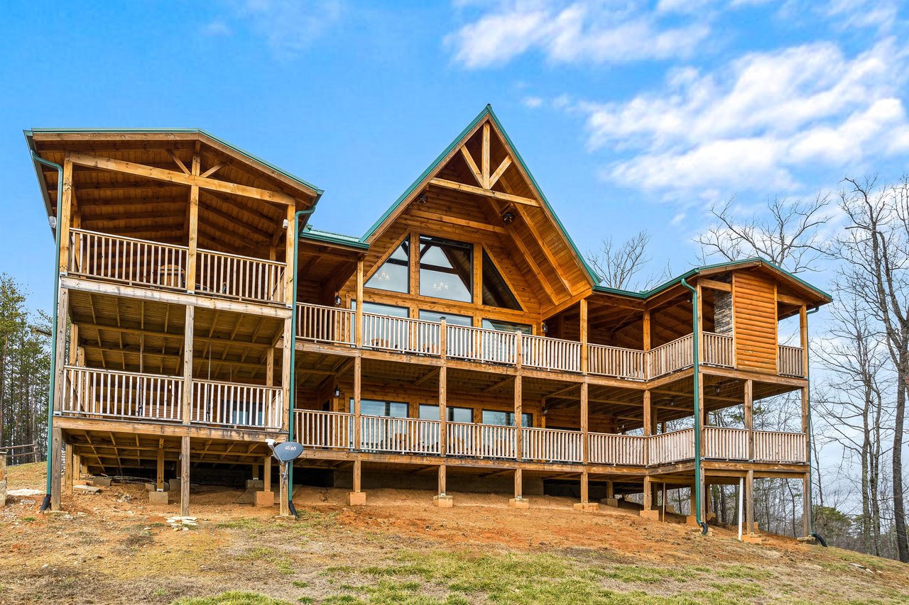 Exterior back view at Four Seasons Grand, a 5 bedroom cabin rental located in Pigeon Forge