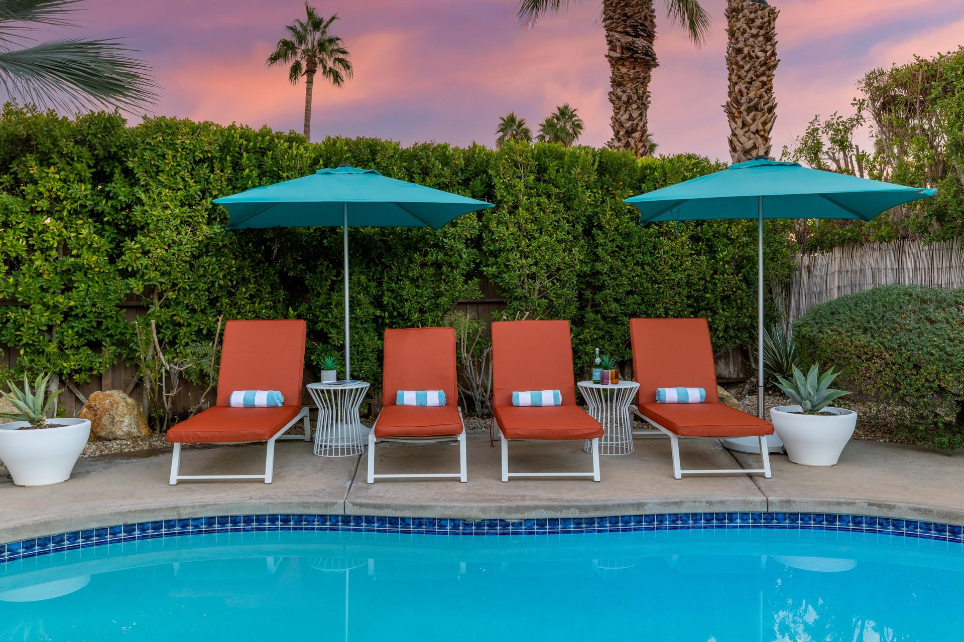 Relax on comfortable lounge chairs by your private pool as the desert sky paints a magical sunset overhead.