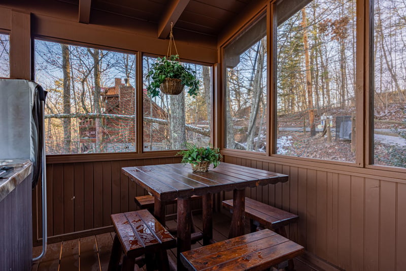 Wooden table with bench chairs