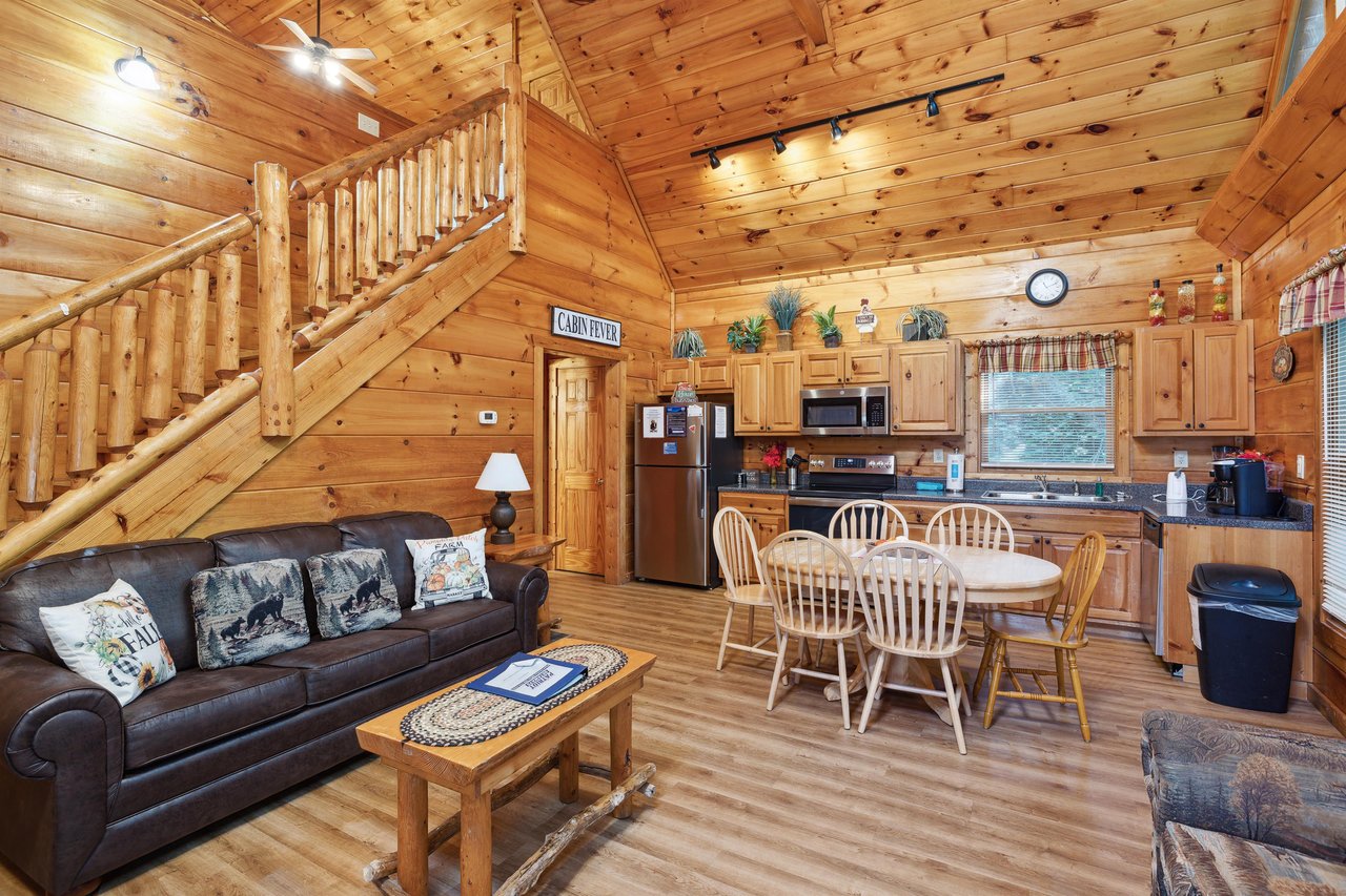 Full kitchen with dining table and chairs