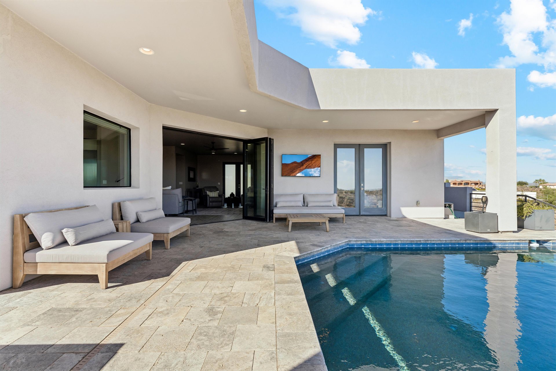 Outdoor seating, outdoor TV, BBQ, and fire pit.