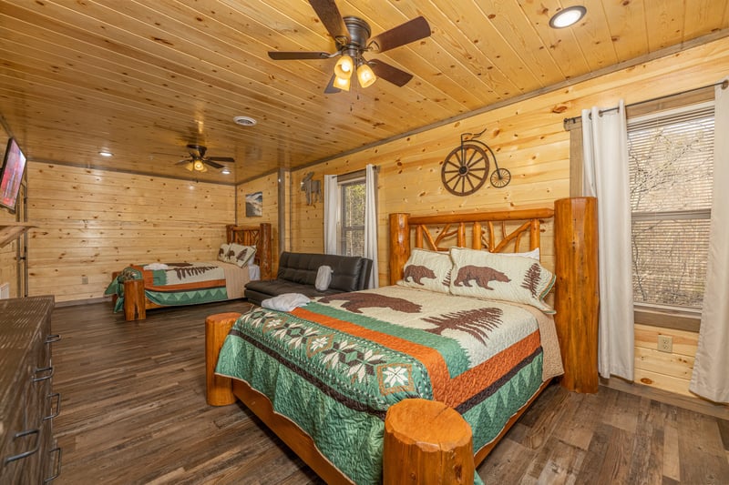 Bedroom with two queen beds at Everlys Splash, a 4 bedroom cabin rental located in Pigeon Forge