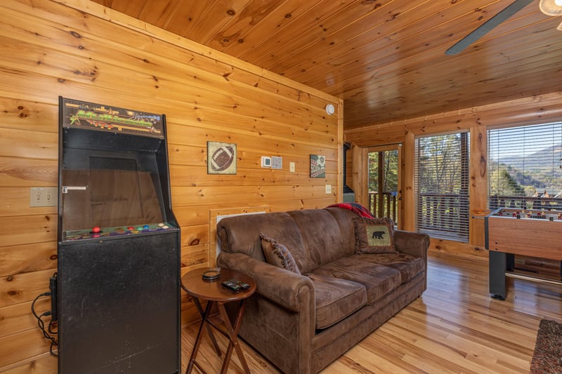 Arcade game in the game room at Bears Dont Bluff, a 3 bedroom cabin rental located in Pigeon Forge