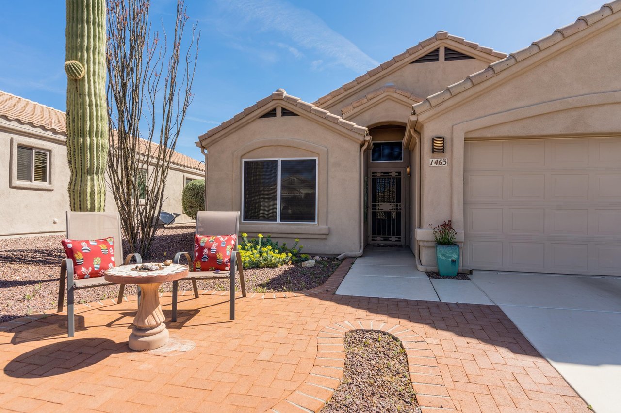 Seating area in the front of the home and view of front door.