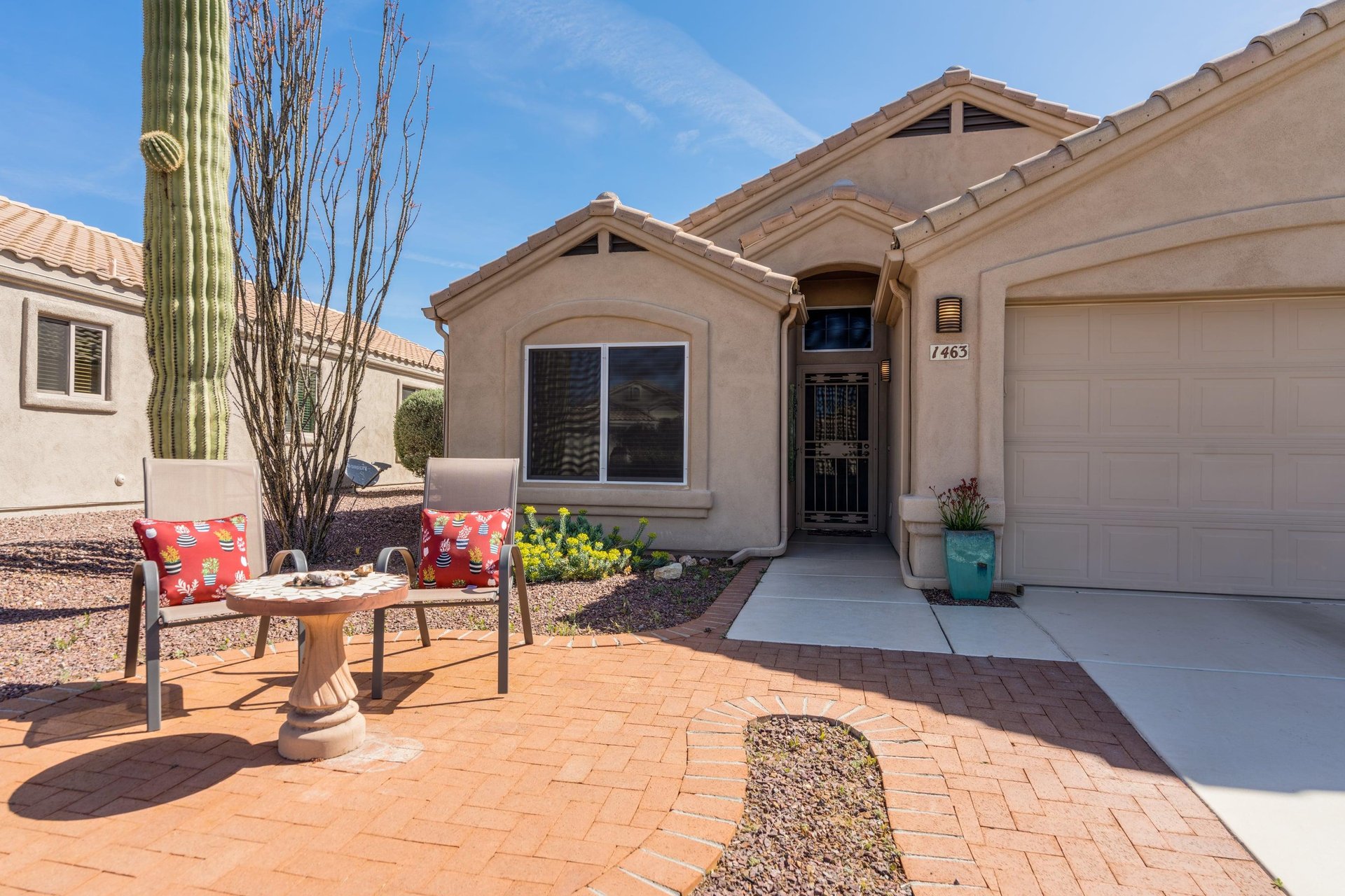 Seating area in the front of the home and view of front door.