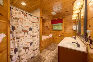 Bathroom at Moonbeams  Cabin Dreams, a 3 bedroom cabin rental located in Pigeon Forge
