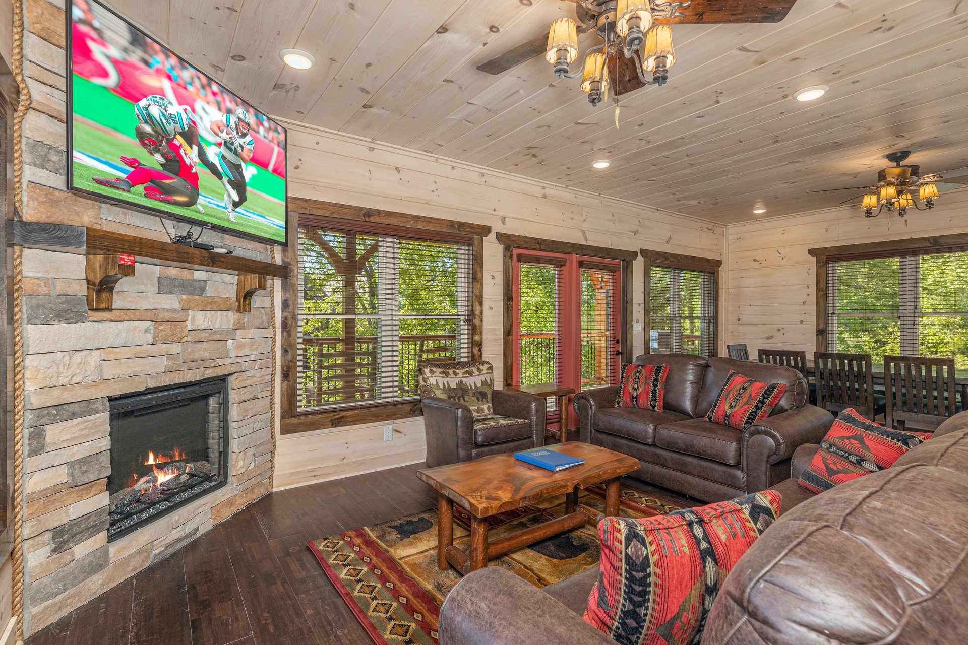 Living room with stone fireplace
