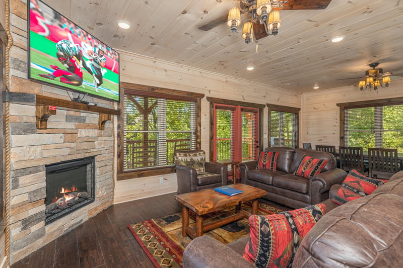 Living room with stone fireplace