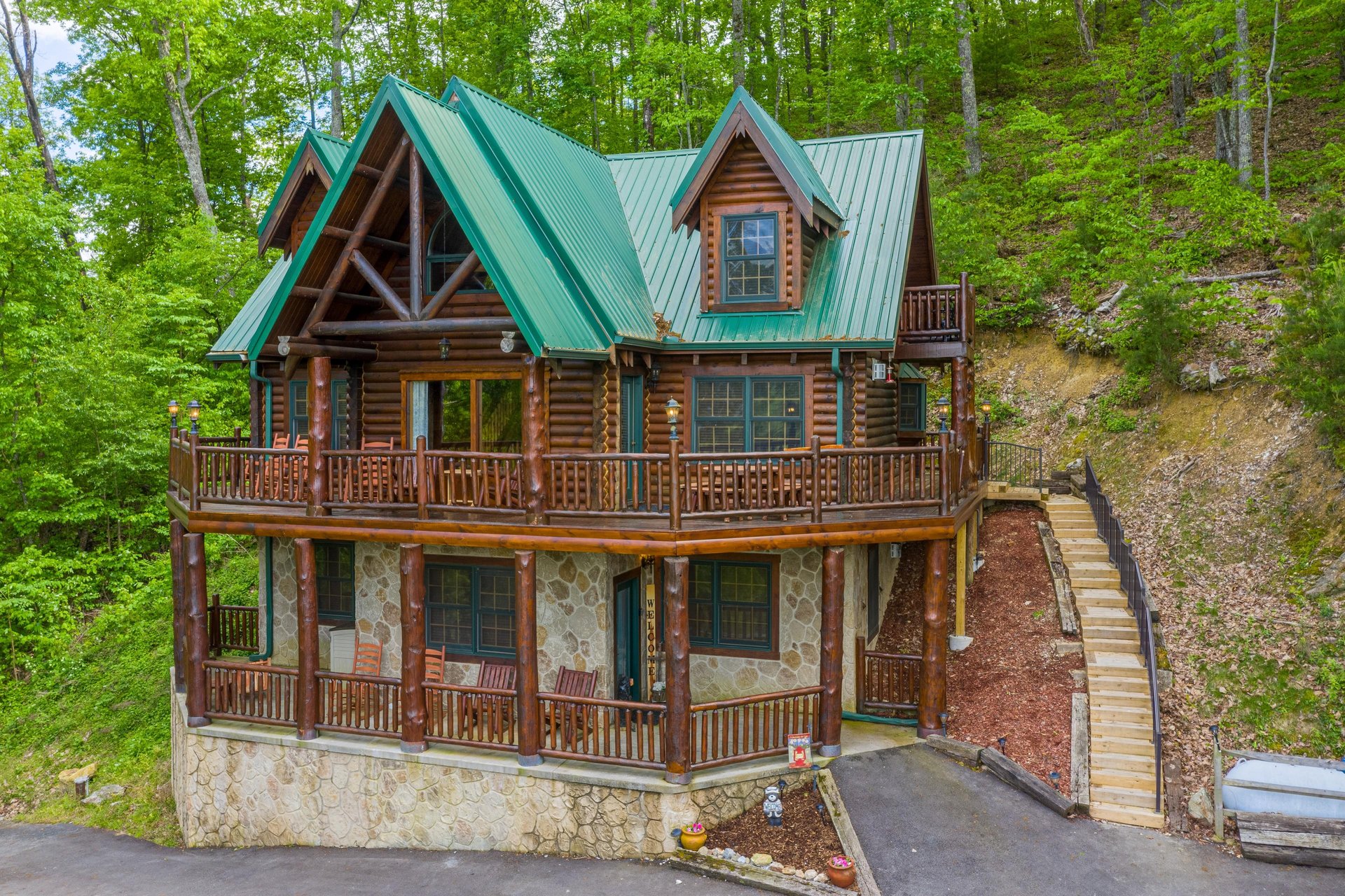 Living room with sofa bed and stone fireplace