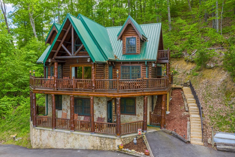 Living room with sofa bed and stone fireplace