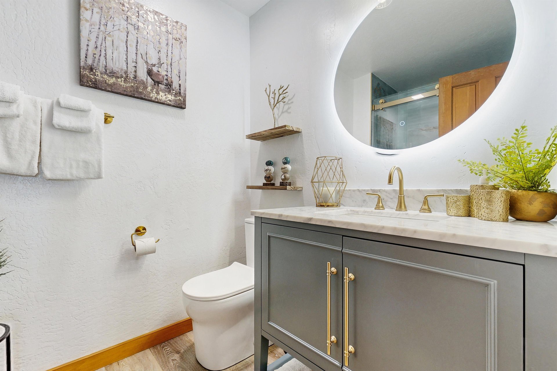 Features modern fixtures and a walkin shower.