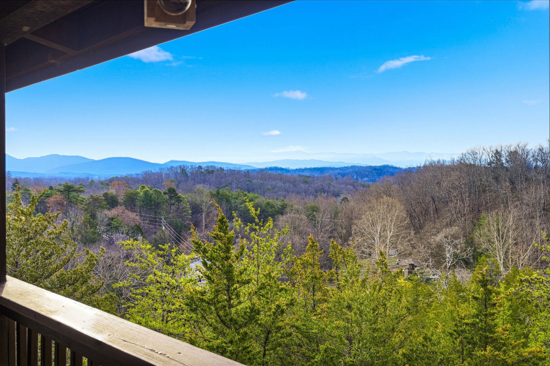 Step onto your private balcony and breathe in the fresh mountain air while taking in sweeping views of rolling hills and endless blue sky.