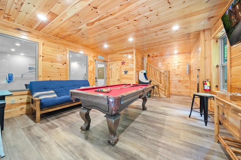 pool table, futon and arcade