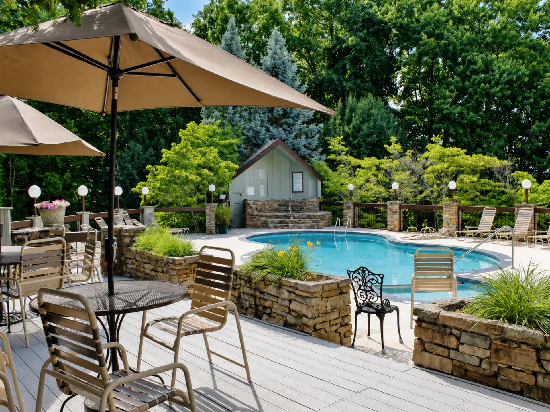 A peaceful poolside retreat surrounded by lush greenery, offering you your own private oasis. Lounge under the umbrellas, dip in the crystalclear water, and unwind in this serene garden setting.
