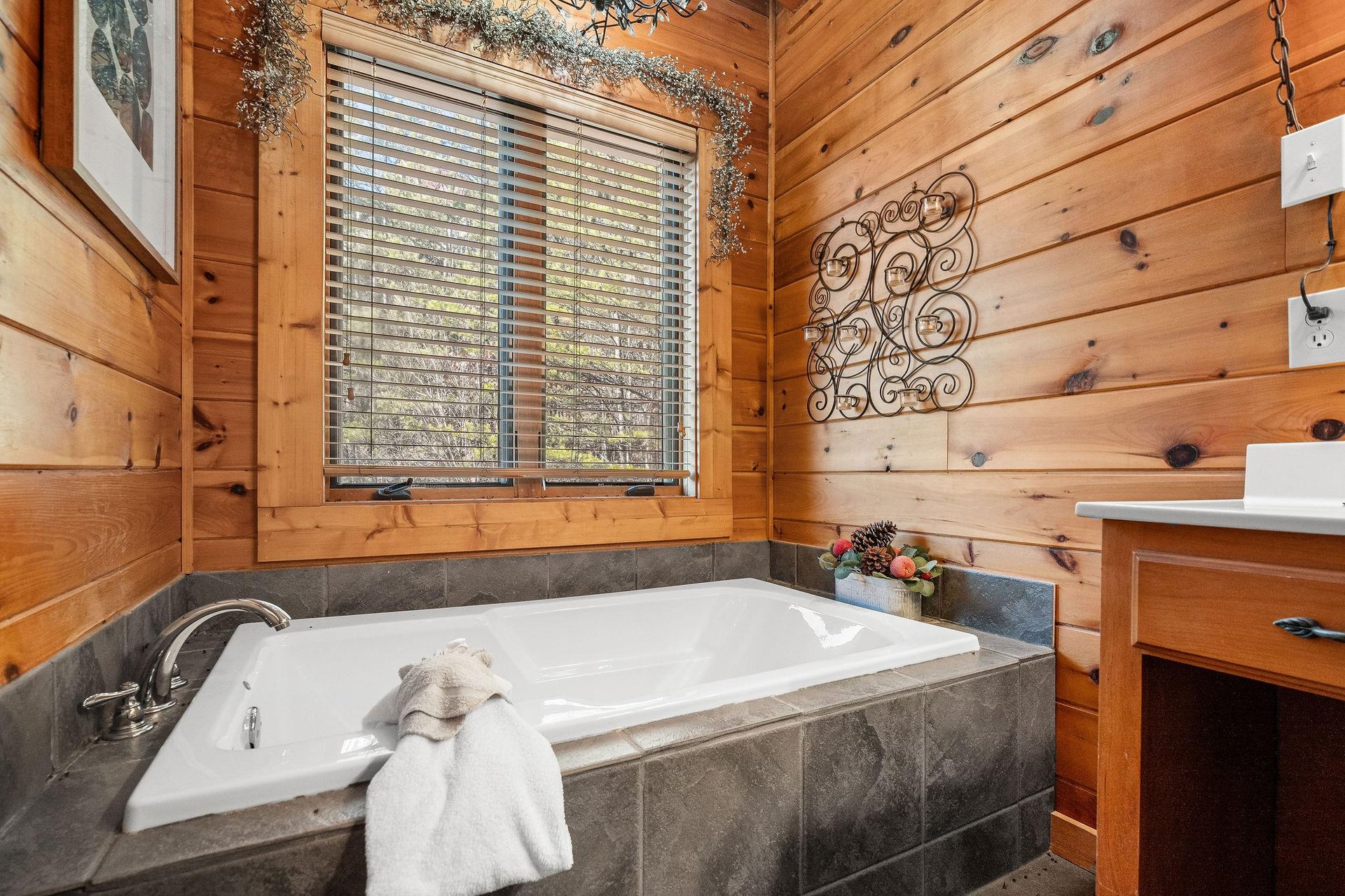 Jacuzzi in a bathroom at Mountain Mama, a 3 bedroom cabin rental located in Pigeon Forge