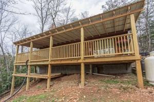 A view of the covered deck at Boogie Bear, a 1bedroom cabin rental located in Gatlinburg