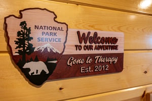 Gone to Therapy cabin sign