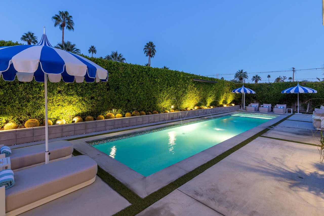 Long pool with gorgeous outdoor lighting